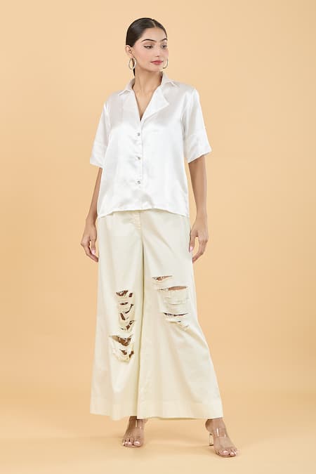 Shop AK-OK White Cotton Cut Work Distressed Pant at Aza Fashions Shop_AK-OK_White Cotton Cut Work Distressed Pant _at_Aza_Fashions