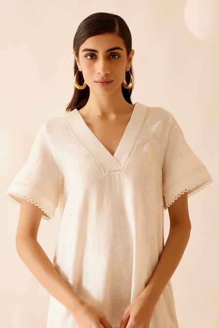 Shop_Bunka_Ivory Cotton Embroidered Lace V Neck Sada Detailed Dress _Online_at_Aza_Fashions