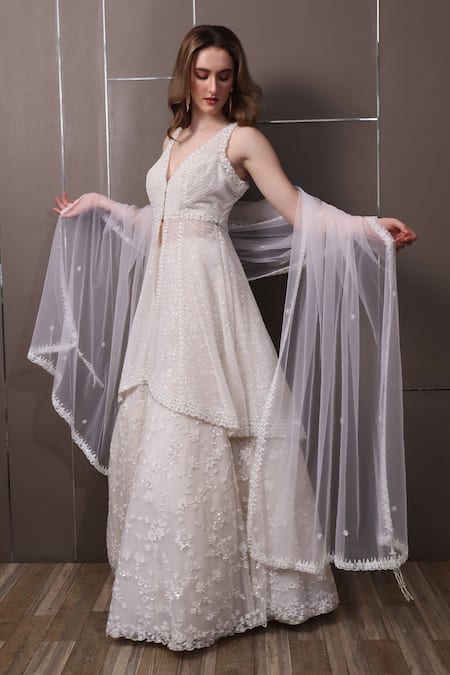 Shop_Sayisha_White Net Sequins, Beads V-neck Floral Hand Embroidered Lehenga Set _at_Aza_Fashions