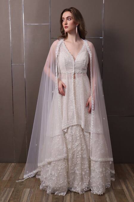Sayisha White Net Sequins, Beads V-neck Floral Hand Embroidered Lehenga Set Online at Aza Fashions Sayisha_White Net Sequins, Beads V-neck Floral Hand Embroidered Lehenga Set _Online_at_Aza_Fashions
