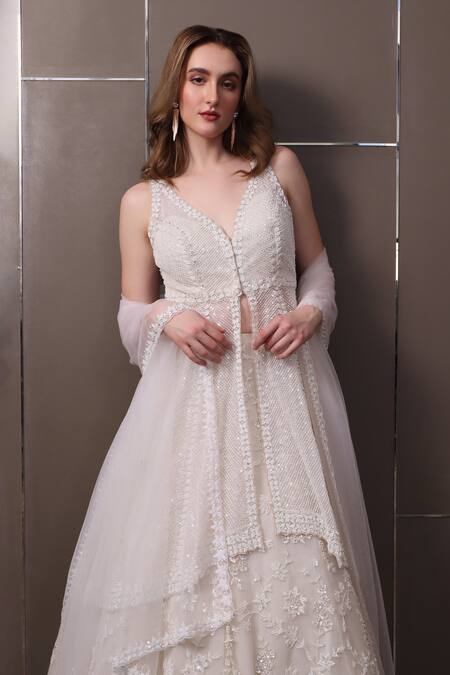Sayisha_White Net Sequins, Beads V-neck Floral Hand Embroidered Lehenga Set _at_Aza_Fashions
