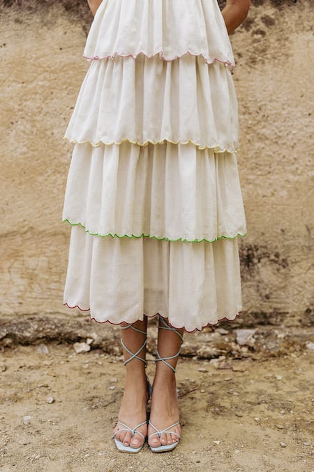 Shop Shimona Off White Tencel Embroidery Ditsy Bloom Scallop Tiered Dress With Inner Online at Aza Fashions Shop_Shimona_Off White Tencel Embroidery Ditsy Bloom Scallop Tiered Dress With Inner _Online_at_Aza_Fashions