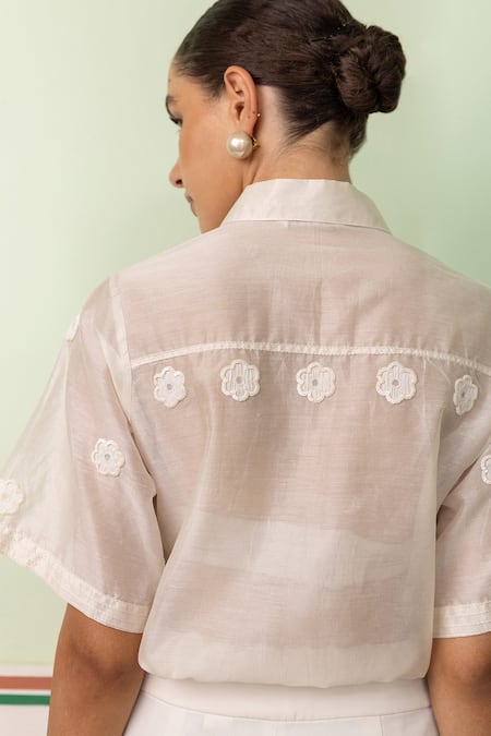 Shop Shimona Off White Chanderi, Cotton, Silk Sequins Collared Blossom Applique Sheer Shirt at Aza Fashions Shop_Shimona_Off White Chanderi, Cotton, Silk Sequins Collared Blossom Applique Sheer Shirt _at_Aza_Fashions