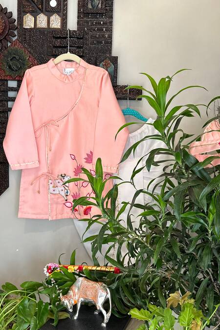 Shop Rage Attire-Sweta Saria Peach Cotton, Silk Beads Cow And Lotus Embroidered Kurta With Dhoti Set at Aza Fashions Shop_Rage Attire-Sweta Saria_Peach Cotton, Silk Beads Cow And Lotus Embroidered Kurta With Dhoti Set _at_Aza_Fashions