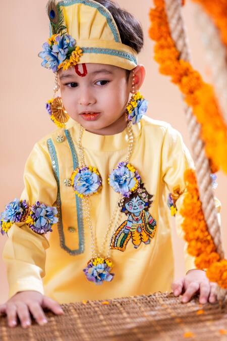 Rage Attire-Sweta Saria Yellow Cotton, Silk Beads Krishna Bansuri Embroidered Kurta With Dhoti Pant Set at Aza Fashions Rage Attire-Sweta Saria_Yellow Cotton, Silk Beads Krishna Bansuri Embroidered Kurta With Dhoti Pant Set _at_Aza_Fashions