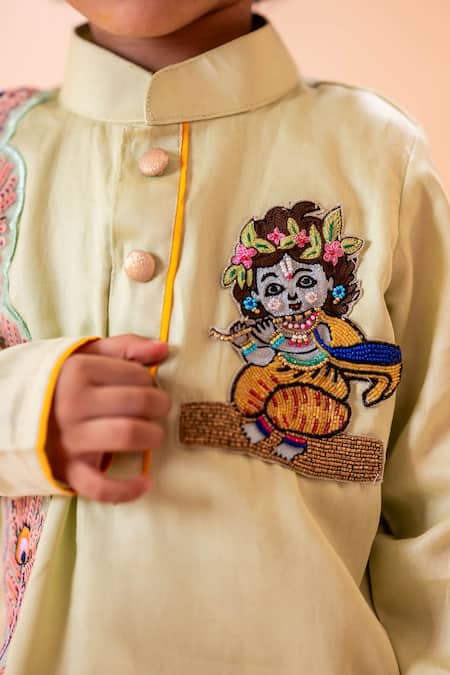 Rage Attire-Sweta Saria_Green Cotton, Krishna Bansuri Embroidered Angrakha Kurta With Dhoti Pant Set _at_Aza_Fashions