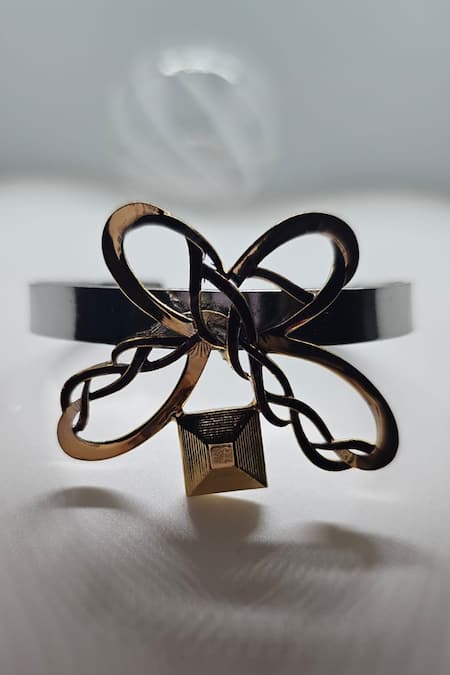 Shop Gaurish Bespoke Jewellery Gold Plated Infinity Butterfly Pattern Carved Bracelet at Aza Fashions Shop_Gaurish Bespoke Jewellery_Gold Plated Infinity Butterfly Pattern Carved Bracelet _at_Aza_Fashions