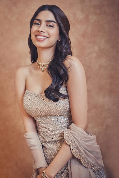 Seema Gujral_Beige Georgette Sequins, Mirrors Embellished Strapless Peplum Kurta Sharara Set _at_Aza_Fashions