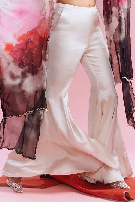 Buy_Dolly J_White Satin Pearls, Sequins Amaya Watercolour Print Cape Flared Pant Set _Online_at_Aza_Fashions