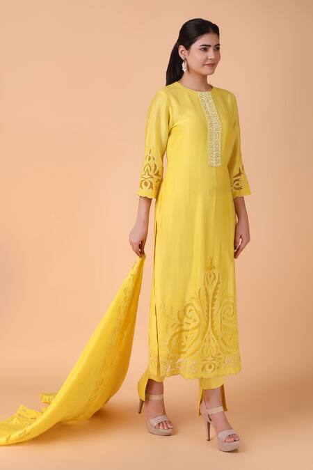Nidhi Kejriwal_Yellow Chanderi, Denim Embroidery, Cut Work Round Neck Floral Kurta Pant Set _at_Aza_Fashions