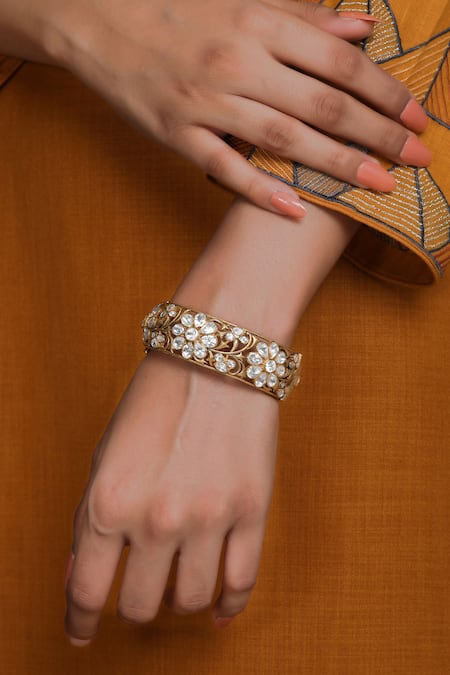 Kaari_Gold Plated Imitation Diamonds Gulnaz Polki Embellished Cutwork Jali Kada _Online_at_Aza_Fashions