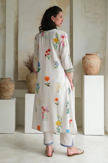 Shop Roza Ivory Linen Printed Floral V-neck Marigold Watercolor Kurta With Pant at Aza Fashions Shop_Roza_Ivory Linen Printed Floral V-neck Marigold Watercolor Kurta With Pant _at_Aza_Fashions