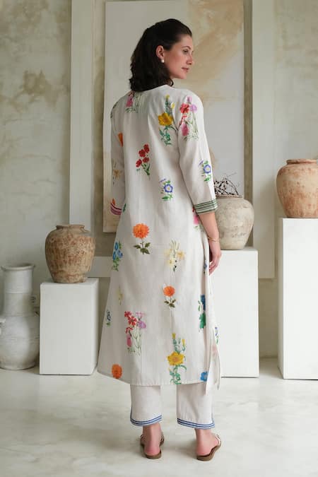 Roza Ivory Linen Printed Floral V-neck Marigold Watercolor Kurta With Pant at Aza Fashions Roza_Ivory Linen Printed Floral V-neck Marigold Watercolor Kurta With Pant _at_Aza_Fashions