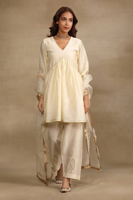 Trendy Tokari Ivory Silk, Chanderi Cut Work, Embroidery, Mirrors V-neck Flared Kurta Pant Set Online at Aza Fashions Trendy Tokari_Ivory Silk, Chanderi Cut Work, Embroidery, Mirrors V-neck Flared Kurta Pant Set _Online_at_Aza_Fashions
