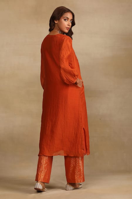 Shop Trendy Tokari Orange Silk, Chanderi Sequins Round Neck Embroidered Yoke Kurta Pant Set at Aza Fashions Shop_Trendy Tokari_Orange Silk, Chanderi Sequins Round Neck Embroidered Yoke Kurta Pant Set _at_Aza_Fashions