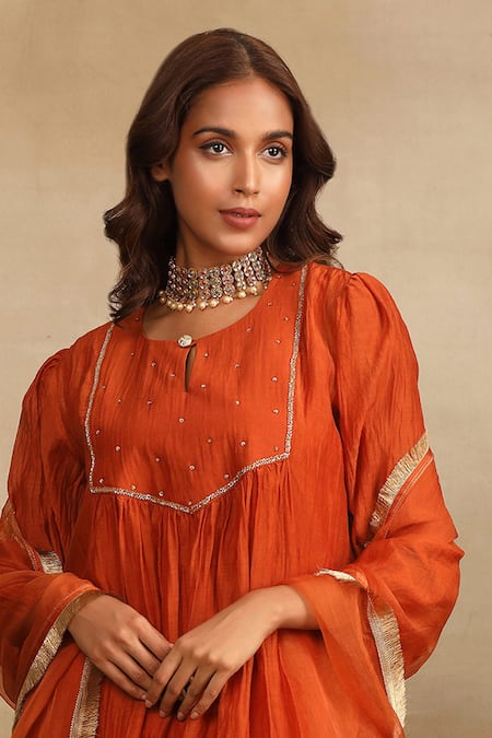 Shop Trendy Tokari Orange Silk, Chanderi Sequins Round Neck Embroidered Yoke Kurta Pant Set Online at Aza Fashions Shop_Trendy Tokari_Orange Silk, Chanderi Sequins Round Neck Embroidered Yoke Kurta Pant Set _Online_at_Aza_Fashions