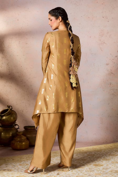 Shop Masaba Beige Silk Sequins, Foil Timber Tribe Printed Asymmetric Tunic With Flared Pant at Aza Fashions Shop_Masaba_Beige Silk Sequins, Foil Timber Tribe Printed Asymmetric Tunic With Flared Pant_at_Aza_Fashions