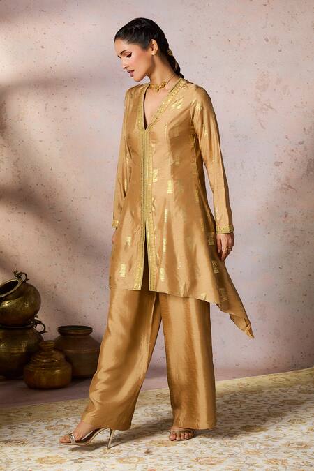 Buy Masaba Beige Silk Sequins, Foil Timber Tribe Printed Asymmetric Tunic With Flared Pant Online at Aza Fashions Buy_Masaba_Beige Silk Sequins, Foil Timber Tribe Printed Asymmetric Tunic With Flared Pant_Online_at_Aza_Fashions