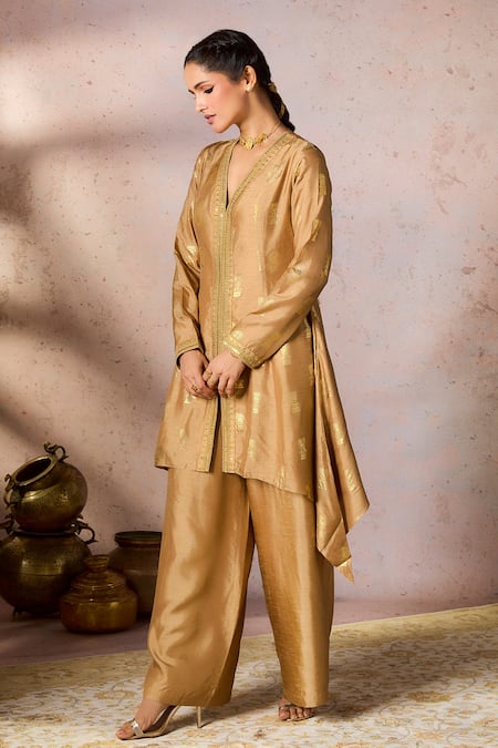 Shop Masaba Beige Silk Sequins, Foil Timber Tribe Printed Asymmetric Tunic With Flared Pant Online at Aza Fashions Shop_Masaba_Beige Silk Sequins, Foil Timber Tribe Printed Asymmetric Tunic With Flared Pant_Online_at_Aza_Fashions