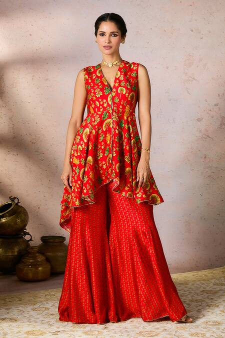 Masaba Red Silk Gota Patti V-neck Nomadic Tribe Printed Asymmetric Tunic And Sharara Set Online at Aza Fashions Masaba_Red Silk Gota Patti V-neck Nomadic Tribe Printed Asymmetric Tunic And Sharara Set_Online_at_Aza_Fashions