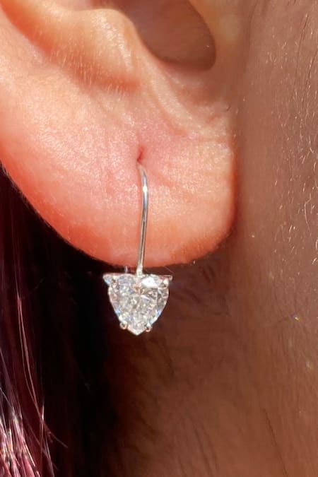 Shop Fiona Diamonds White Imitation Diamonds 18kt Gold Heart Shaped Lab Earrings at Aza Fashions Shop_Fiona Diamonds_White Imitation Diamonds 18kt Gold Heart Shaped Lab Earrings_at_Aza_Fashions