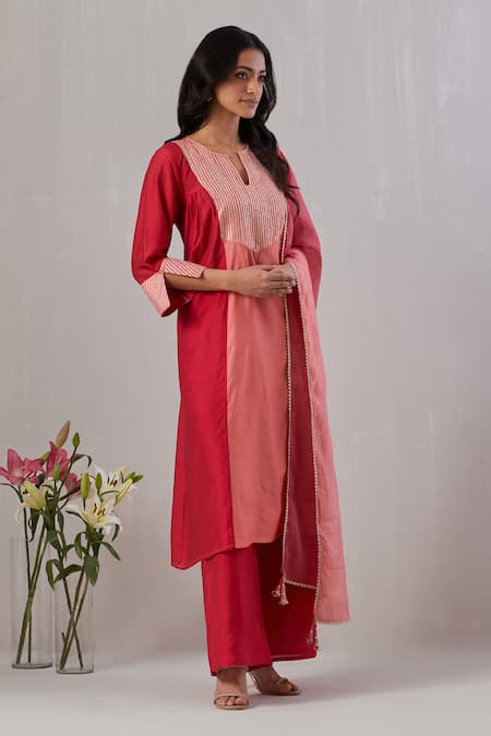 Shop Grass & Sunshine Red Viscose Gota Patti, Tassels Round Stripe Yoke Embroidered Kurta Palazzo Set Online at Aza Fashions Shop_Grass & Sunshine_Red Viscose Gota Patti, Tassels Round Stripe Yoke Embroidered Kurta Palazzo Set _Online_at_Aza_Fashions
