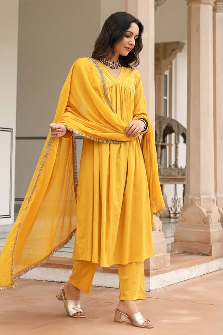 Buy Pheeta Yellow Mulmul Embroidery Fringe Lace V-neck Yoke Gathered Anarkali And Pant Set Online at Aza Fashions Buy_Pheeta_Yellow Mulmul Embroidery Fringe Lace V-neck Yoke Gathered Anarkali And Pant Set_Online_at_Aza_Fashions