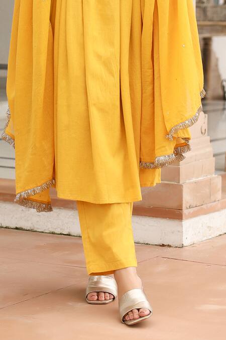 Pheeta Yellow Mulmul Embroidery Fringe Lace V-neck Yoke Gathered Anarkali And Pant Set at Aza Fashions Pheeta_Yellow Mulmul Embroidery Fringe Lace V-neck Yoke Gathered Anarkali And Pant Set_at_Aza_Fashions