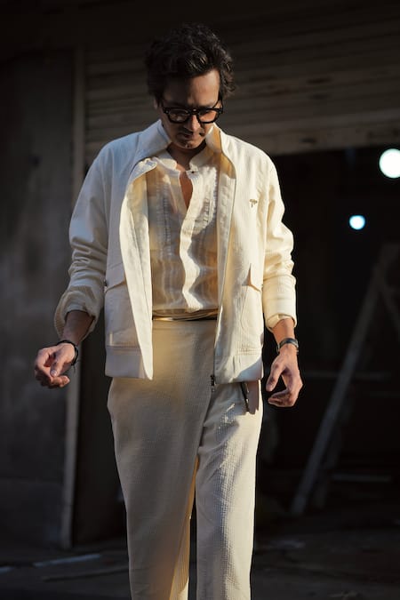 Shop Jatin Malik Ivory Cotton Plumb Bomber Jacket And Trouser Set at Aza Fashions Shop_Jatin Malik_Ivory Cotton Plumb Bomber Jacket And Trouser Set _at_Aza_Fashions