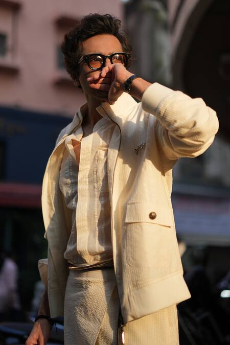 Shop Jatin Malik Ivory Cotton Plumb Bomber Jacket And Trouser Set Online at Aza Fashions Shop_Jatin Malik_Ivory Cotton Plumb Bomber Jacket And Trouser Set _Online_at_Aza_Fashions