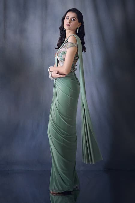 Aariyana Couture Green Net, Lycra Cut Work Pre-draped Saree With Cold Shoulder Embroidered Blouse Online at Aza Fashions Aariyana Couture_Green Net, Lycra Cut Work Pre-draped Saree With Cold Shoulder Embroidered Blouse _Online_at_Aza_Fashions