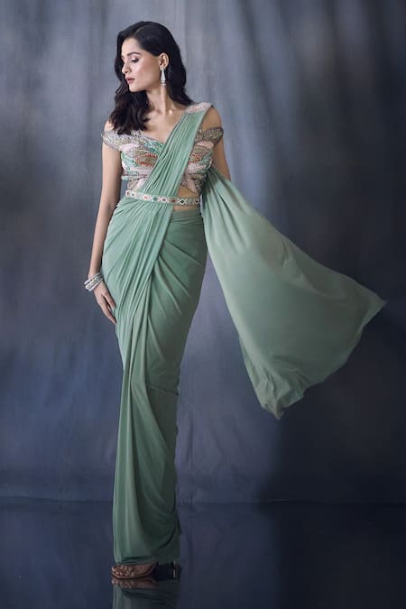 Shop Aariyana Couture Green Net, Lycra Cut Work Pre-draped Saree With Cold Shoulder Embroidered Blouse Online at Aza Fashions Shop_Aariyana Couture_Green Net, Lycra Cut Work Pre-draped Saree With Cold Shoulder Embroidered Blouse _Online_at_Aza_Fashions