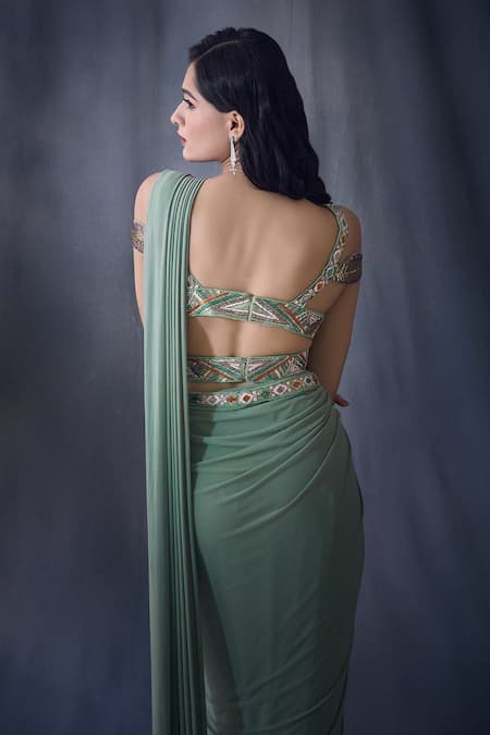 Aariyana Couture Green Net, Lycra Cut Work Pre-draped Saree With Cold Shoulder Embroidered Blouse at Aza Fashions Aariyana Couture_Green Net, Lycra Cut Work Pre-draped Saree With Cold Shoulder Embroidered Blouse _at_Aza_Fashions