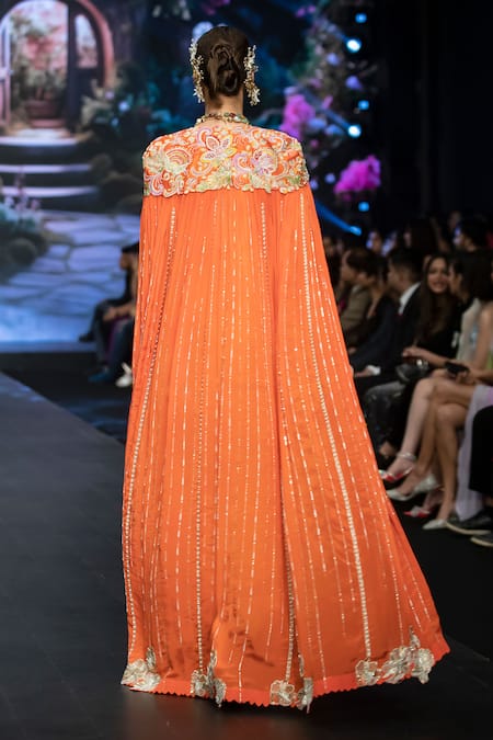 Shop_Anu Pellakuru_Orange Silk Sequins, Embroidery V-neck Resham Floral Cape Draped Skirt Set _at_Aza_Fashions