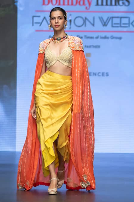 Anu Pellakuru_Orange Silk Sequins, Embroidery V-neck Resham Floral Cape Draped Skirt Set _Online_at_Aza_Fashions