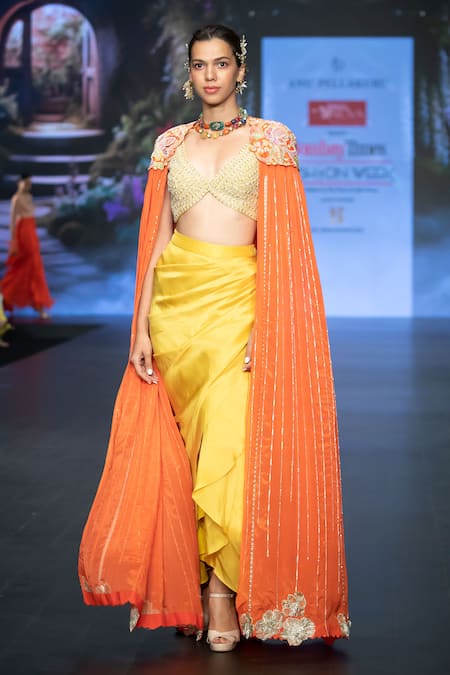Anu Pellakuru_Orange Silk Sequins, Embroidery V-neck Resham Floral Cape Draped Skirt Set _at_Aza_Fashions