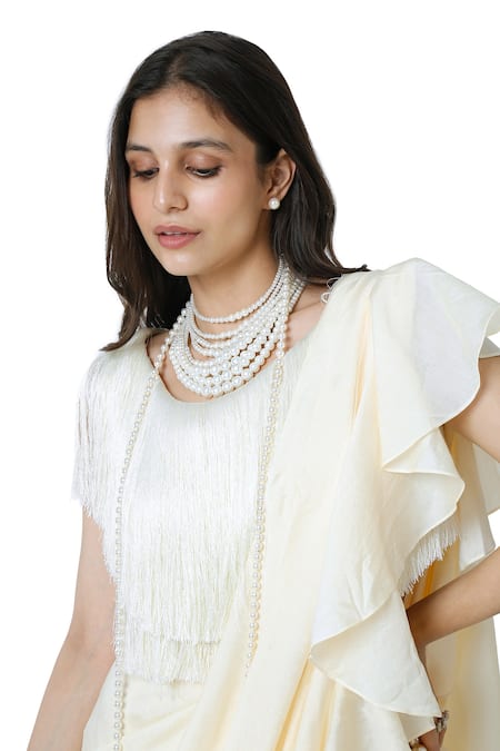 Buy_Komal Shah_Off White Saree Chanderi Fringe Round Ruffle Pre-draped With Blouse _Online_at_Aza_Fashions