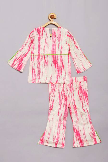 Shop Tutus By Tutu Pink Flat Silk Printed Shibori Kurta Bell Bottom Set at Aza Fashions Shop_Tutus By Tutu_Pink Flat Silk Printed Shibori Kurta Bell Bottom Set_at_Aza_Fashions