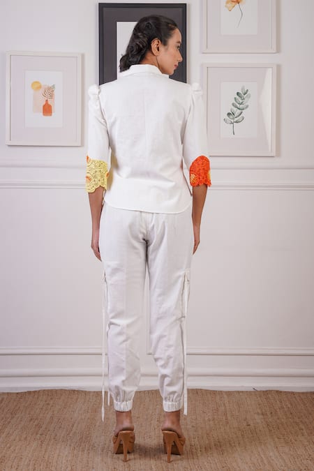 Shop Ankur J White Linen Textured Crochet Lapel Collar Lace Embellished Blazer With Joggers at Aza Fashions Shop_Ankur J_White Linen Textured Crochet Lapel Collar Lace Embellished Blazer With Joggers _at_Aza_Fashions