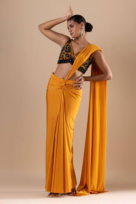 Raj Arora Yellow Lycra Sequins, Cut Work V-neck Pre-draped Saree With Embroidered Blouse at Aza Fashions Raj Arora_Yellow Lycra Sequins, Cut Work V-neck Pre-draped Saree With Embroidered Blouse _at_Aza_Fashions