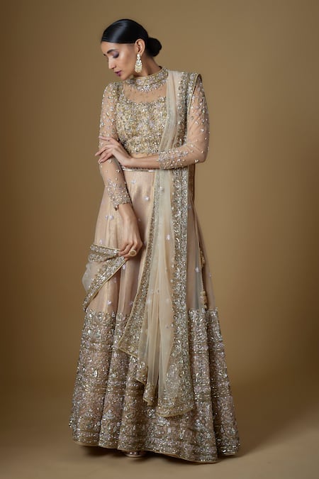 FATIZ Gold Tulle Cut Work, Sequins, Zari High Neck Embroidered Blouse Lehenga Set at Aza Fashions FATIZ_Gold Tulle Cut Work, Sequins, Zari High Neck Embroidered Blouse Lehenga Set _at_Aza_Fashions