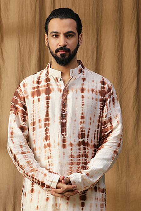 Shop Kudrat Couture Off White Chanderi Silk Asymmetric Tie-dye Kurta And Churidar Set at Aza Fashions Shop_Kudrat Couture_Off White Chanderi Silk Asymmetric Tie-dye Kurta And Churidar Set_at_Aza_Fashions