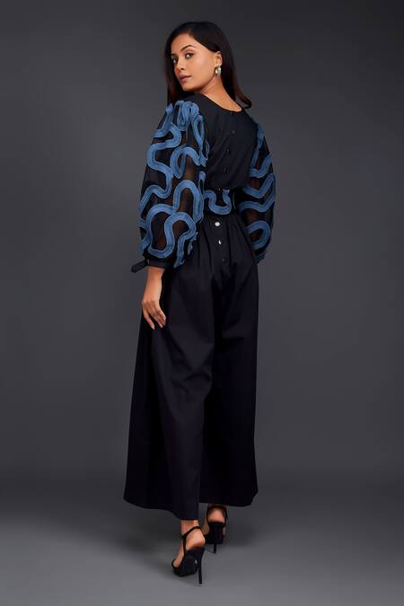 Shop Deepika Arora Black Cotton V-neck Contrasting Pleated Frill Jumpsuit at Aza Fashions Shop_Deepika Arora_Black Cotton V-neck Contrasting Pleated Frill Jumpsuit_at_Aza_Fashions