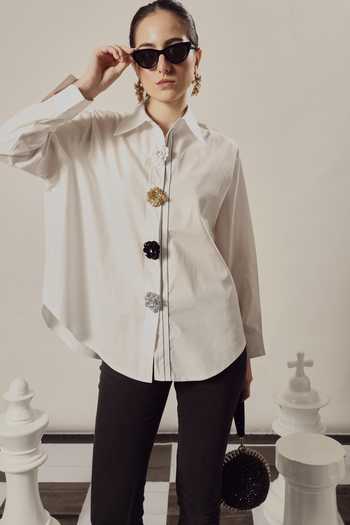 Buy Tasuvure White Cotton Stones Collared Beatrix Bejewelled Button Embellished Shirt Online at Aza Fashions Buy_Tasuvure_White Cotton Stones Collared Beatrix Bejewelled Button Embellished Shirt_Online_at_Aza_Fashions