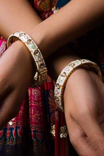 Queens Jewels Gold Plated Stones, Metallic Thread, Floral Meenakari Kundan Bangle-Set of 2 Online at Aza Fashions Queens Jewels_Gold Plated Stones, Metallic Thread, Floral Meenakari Kundan Bangle-Set of 2 _Online_at_Aza_Fashions