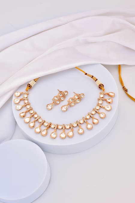 Shop Swabhimann Rose Gold Stones Tear Drop Polki Embellished Necklace Set at Aza Fashions Shop_Swabhimann_Rose Gold Stones Tear Drop Polki Embellished Necklace Set _at_Aza_Fashions