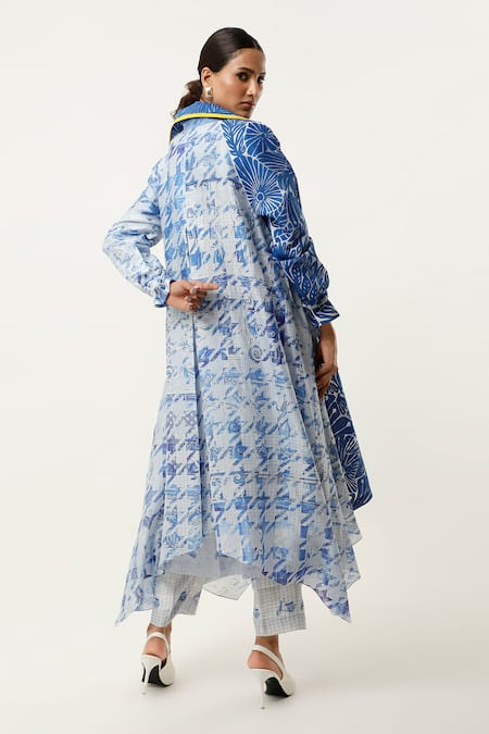 Shop Jajaabor Blue Silk Chanderi Embroidered Cutwork Notched Lapel Asymmetric Organza Trench at Aza Fashions Shop_Jajaabor_Blue Silk Chanderi Embroidered Cutwork Notched Lapel Asymmetric Organza Trench _at_Aza_Fashions