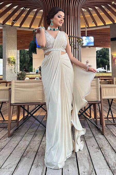 Shop_Seeaash_Ivory Lycra Embroidery Crystal Deep V Neck Pre-draped Saree With Blouse_Online_at_Aza_Fashions