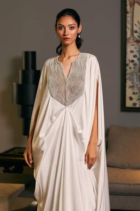 Siddartha Tytler Ivory Lycra, Satin Embroidery Split V-neck Crystal Rope Embellished Kaftan Online at Aza Fashions Siddartha Tytler_Ivory Lycra, Satin Embroidery Split V-neck Crystal Rope Embellished Kaftan _Online_at_Aza_Fashions