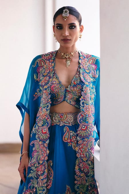 Shop Mrunalini Rao Blue Silk Embroidery, Pearls, Zari Plunge Neck Ekam Cape Lehenga Set at Aza Fashions Shop_Mrunalini Rao_Blue Silk Embroidery, Pearls, Zari Plunge Neck Ekam Cape Lehenga Set _at_Aza_Fashions